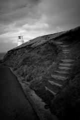 Lighthouse, looking out to sea, black and white