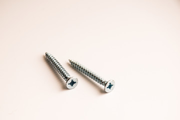 new screws on a white background