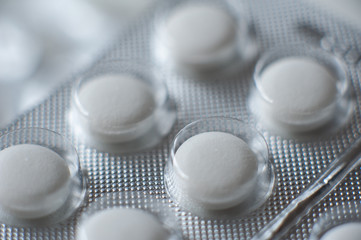 These Are White Pills In A Blister. Macro Photo. Medicine.