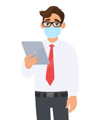 Young business man in safety medical mask, holding tablet computer device. Person using digital touch pad. Modern technology lifestyle. Corona virus epidemic outbreak. Cartoon illustration in vector.