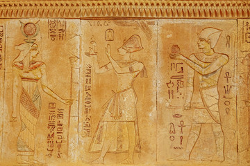 Egyptian hieroglyphs on the wall. Ancient Egypt scene, mythology.