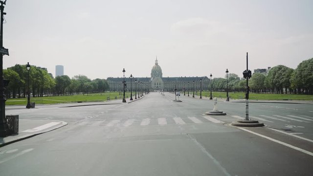 Paris, France / 04 13 2020: Deserted Paris road leading to Invalides during coronavirus / Covid19 lockdown in Paris, France 4K