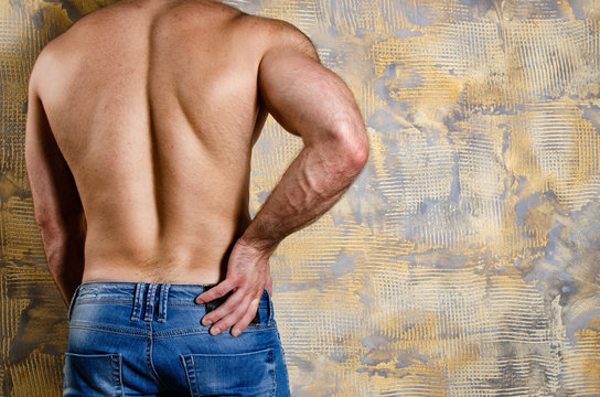 Young attractive man. Beautiful body.