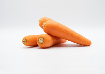 Carrot from market on white background. It is an ingredient for many kind of food savory, dessert, beverage. Salad, soup, cake, smoothie and many dish that can made by carrot and good for health.