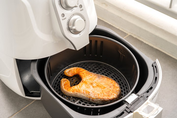 Salmon Meat steak In an oil-free electric fryer Terrace on the condo room Homemade food