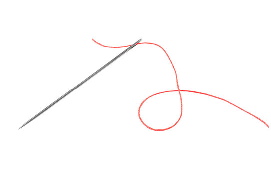 red thread and needle solated on white background