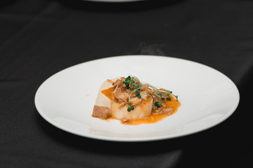 stewed rabbit on a piece of homemade bread