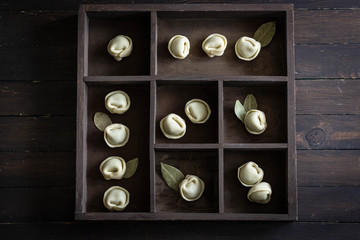 Fancy chocolates candy with cherries. Dumpling sweets