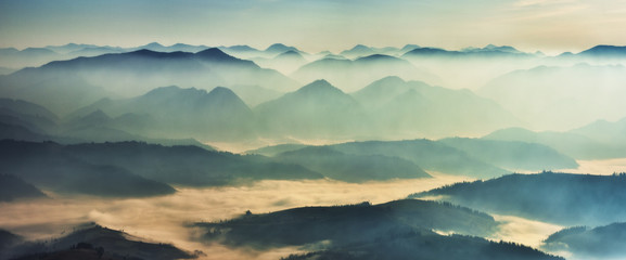 silhouettes of mountains. foggy autumn morning. Morning Carpathians