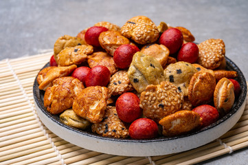 Tasty asian vegetarian appetizer, crunchy rice en peanuts snacks from Japan