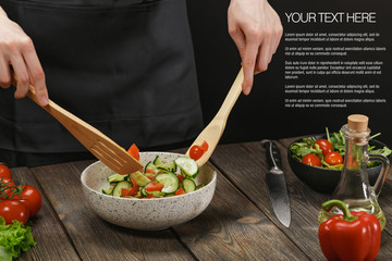 Woman mixing fresh vegetable salad. Female hands. Diet concept for healthy lifestyle with sample text.