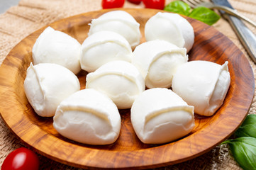 Tasty italian food, fresh white buffalo mozzarella soft cheese balls from Campania