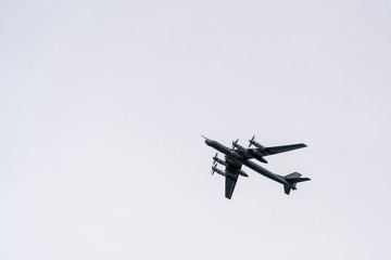 Plane in the sky in the gloomy weather