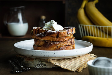 Toast with banana and curd cheese. A simple idea for breakfast.
