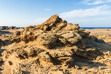 Fototapeta na wymiar Detail of the rock formations of the rocky coast of menorca (balearic islands, spain)