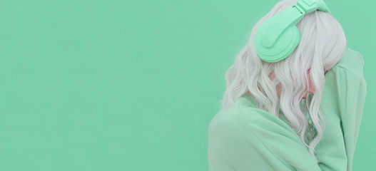 Vanilla Dj Blonde Girl. Headphones Party style. Fresh aesthetic mint colours. Listen to light music