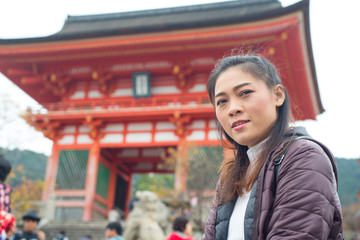 Asian woman in autumn nature background at kyoto,Japan