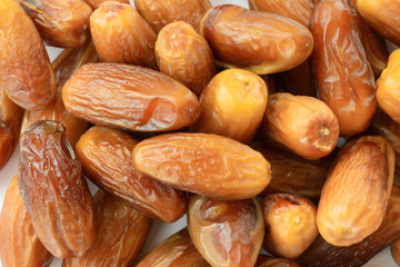 Pattern made of a lot of dried sweet deglet nour date fruites.Organic vegetarian food
