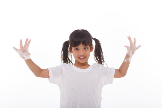 Child Washing Hands And Showing Soapy Palms.on White Background