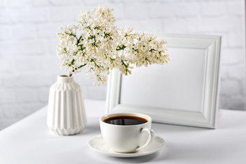 Still life with white objects on a white background.