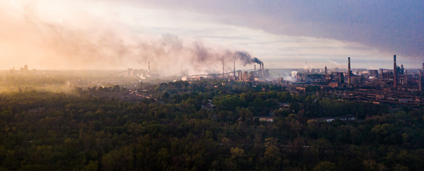 industry metallurgical plant dawn smoke smog emissions bad ecology aerial photography