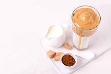 whipped dalgona coffee with milk and cane sugar. South Korean summer drink