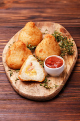sicilian arancini di riso. risotto rice balls. Coxinha of chicken, Brazilian