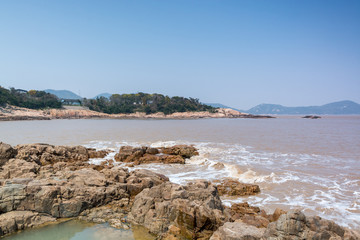 Fototapeta na wymiar Landscape of seaside of Mount Luojia, which lies in the Lotus Sea to the southeast of Putuo Mountain, Zhoushan, Zhejiang, the place where Bodhisattva Guanyin practiced Buddhism