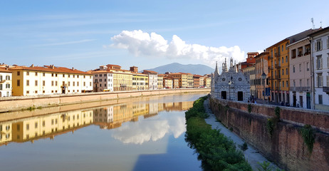 View of the Santa Maria della Spina church and the Arno river in Pisa, Italy.