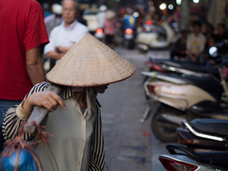 Street seller in Hanoi, Vietnam, Asia