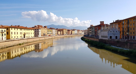 View of the Santa Maria della Spina church and the Arno river in Pisa, Italy.