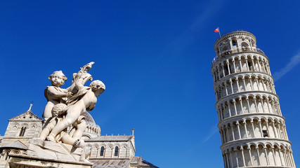View of an ancient sculpture in front of the Pisa Cathedral (Duomo di Pisa) in Pisa, Italy. It is...
