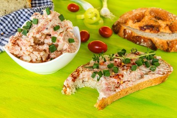 Meat spread and homemade bread. Home cooking. Breakfast. Spread with chili peppers.
