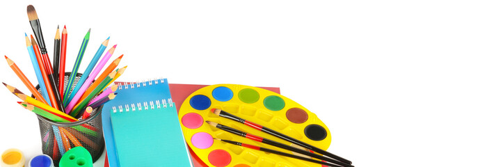 School and office supplies isolated on a white background. Free space for text. Wide photo .