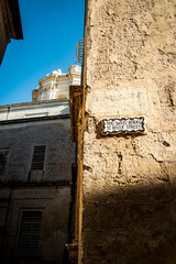 Triq Santu Rokku in Malta landmark sign in shadow and light