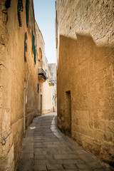 Streets of Mdina Malta Golden hour of a fabulous city with strong heritage and atmosphere of fantasy ethernal town