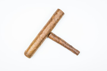 Two best cigars from twisted sheets on white background.