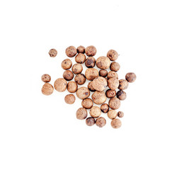 Small pile of black pepper isolated on white background.