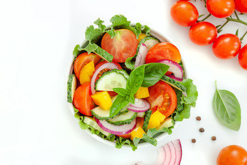 Green salad with tomato and fresh vegetables