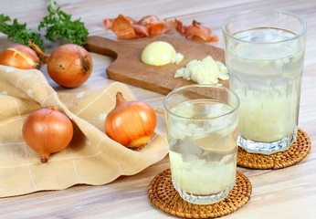 Hot onion tea against cough and flu.  Homemade tea from raw cut onion and hot water.