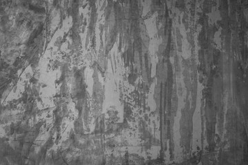 Fototapeta premium Tekstura szarej betonowej powierzchni ściany. Niektóre pęknięcia i rysy, nadające się do wykorzystania jako wzór lub obraz tła.