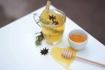 Warm herbal tea with rosemary, anise, ginger and honey