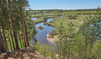 Landscape with a curving river from a high bank