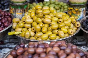 Green and black olives in the oriental market 