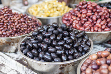 Green and black olives in the oriental market 