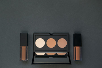 Set of decorative cosmetics on dark  background.