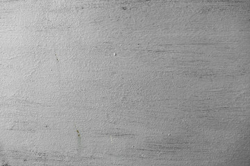 Rough surface of the wall painted in silver color. Abstract textured background. Empty space