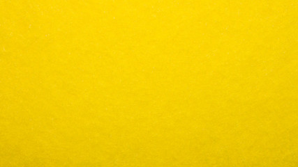 Bright yellow sunny fabric texture.Yellow velvet fabric background.