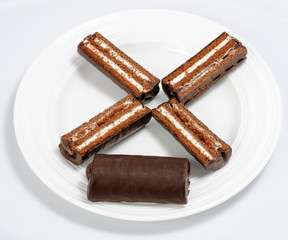 Snack cake that has been sliced into four pieces