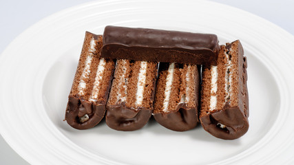Snake cake cut into pieces and server up on a plate